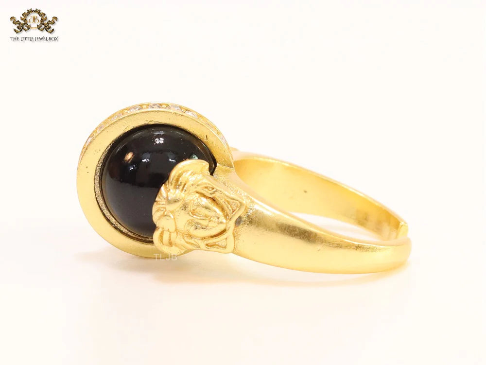 Double gold Medusa with CZ on black ball ring