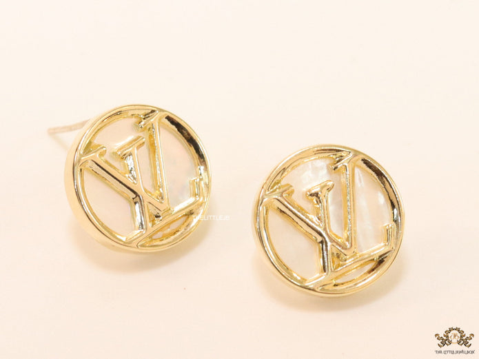 Gold plated alphabet motif studs in golden circular ring
