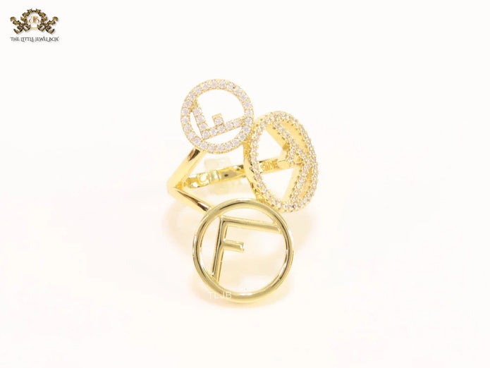 Triple F on a ring with CZ gold plated ring