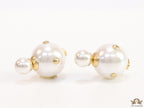 White pearl studs with golden alphabet motif and golden details