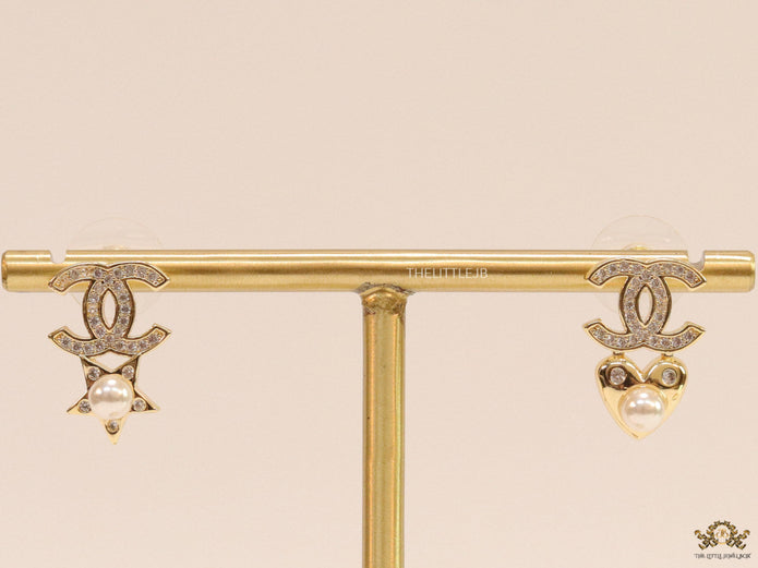 Gold plated double C earrings with pearl heart and star