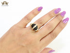 Double gold Medusa with CZ on black ball ring
