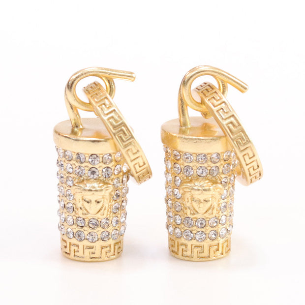 Gold plated hoop with cubic zirconia and 3d golden Medusa motif on cylidrical drop.