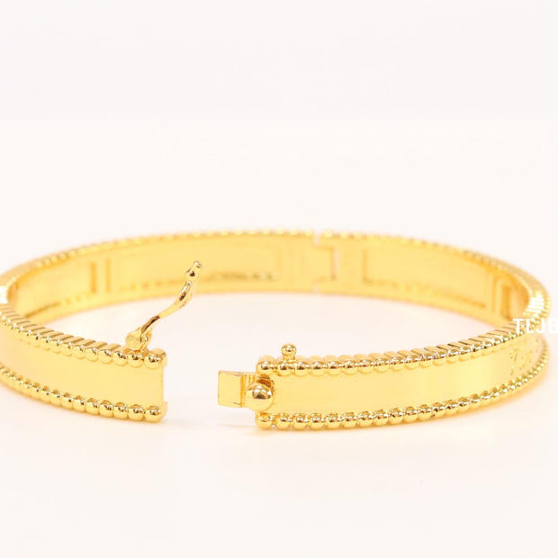 Sleek gold bracelet
