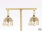 Simple gold plated hoops with golden and cubic zirconia stone queen bee and alphabets