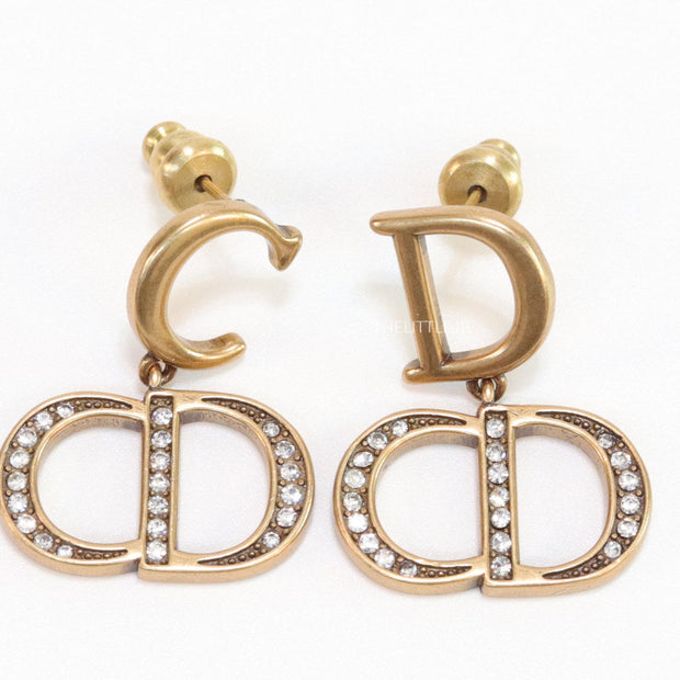 Designer alphabet earrings in gold and cz