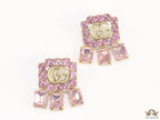 Lavender stone studes with gold plaetd double G motif and lavender stone drop