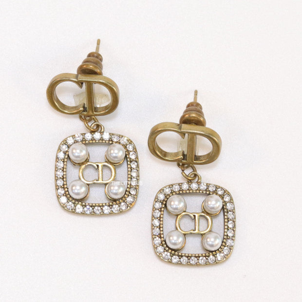 Antique gold plated alphabet motif studs with cubic zirconia stones, white pearl and alphabets