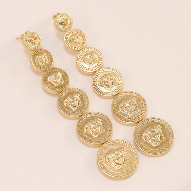 Gold plated embossed Medusa motif on golden circular base with golden details long chain studs