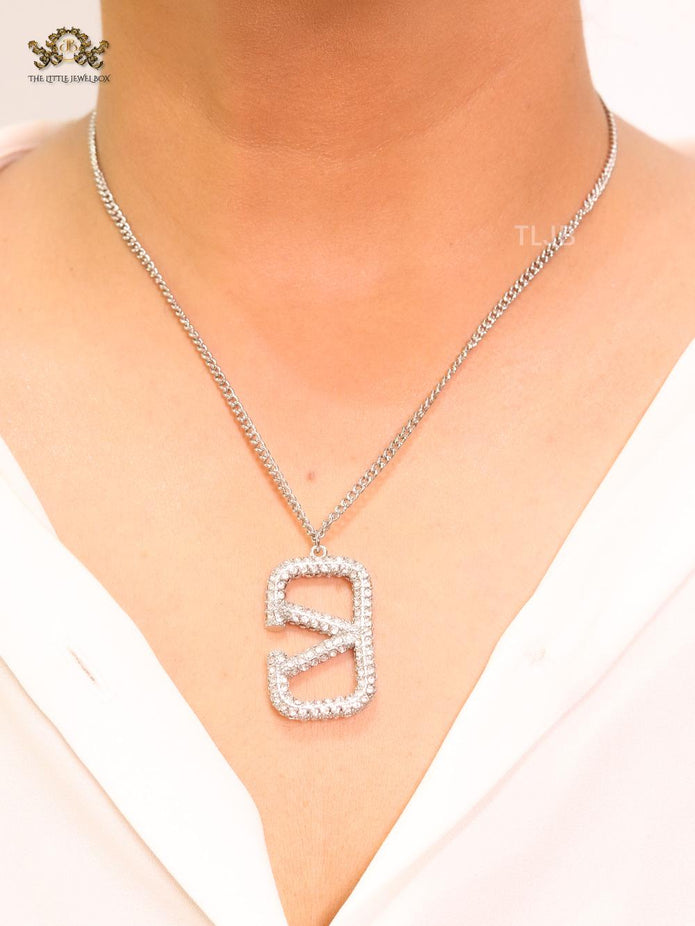 Open V Platinum plated vertical charm pendant with CZ