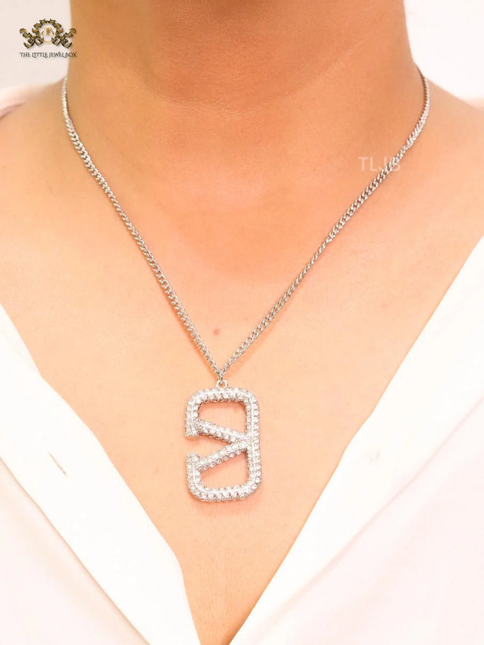 Open V Platinum plated vertical charm pendant with CZ
