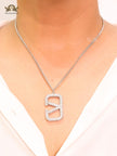 Open V Platinum plated vertical charm pendant with CZ