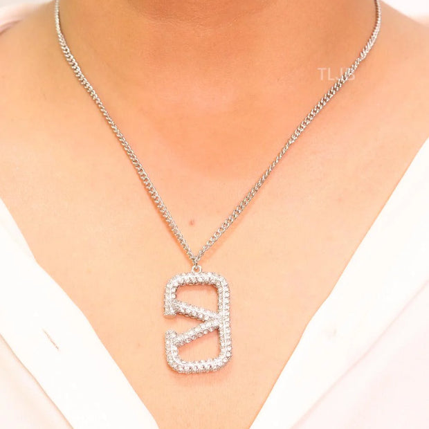 Open V Platinum plated vertical charm pendant with CZ