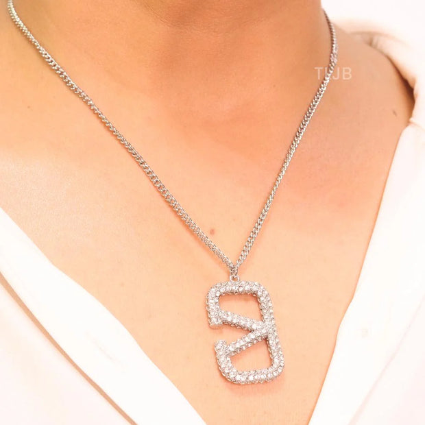 Open V Platinum plated vertical charm pendant with CZ
