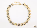 Gold plated Medusa motif on black circles necklace