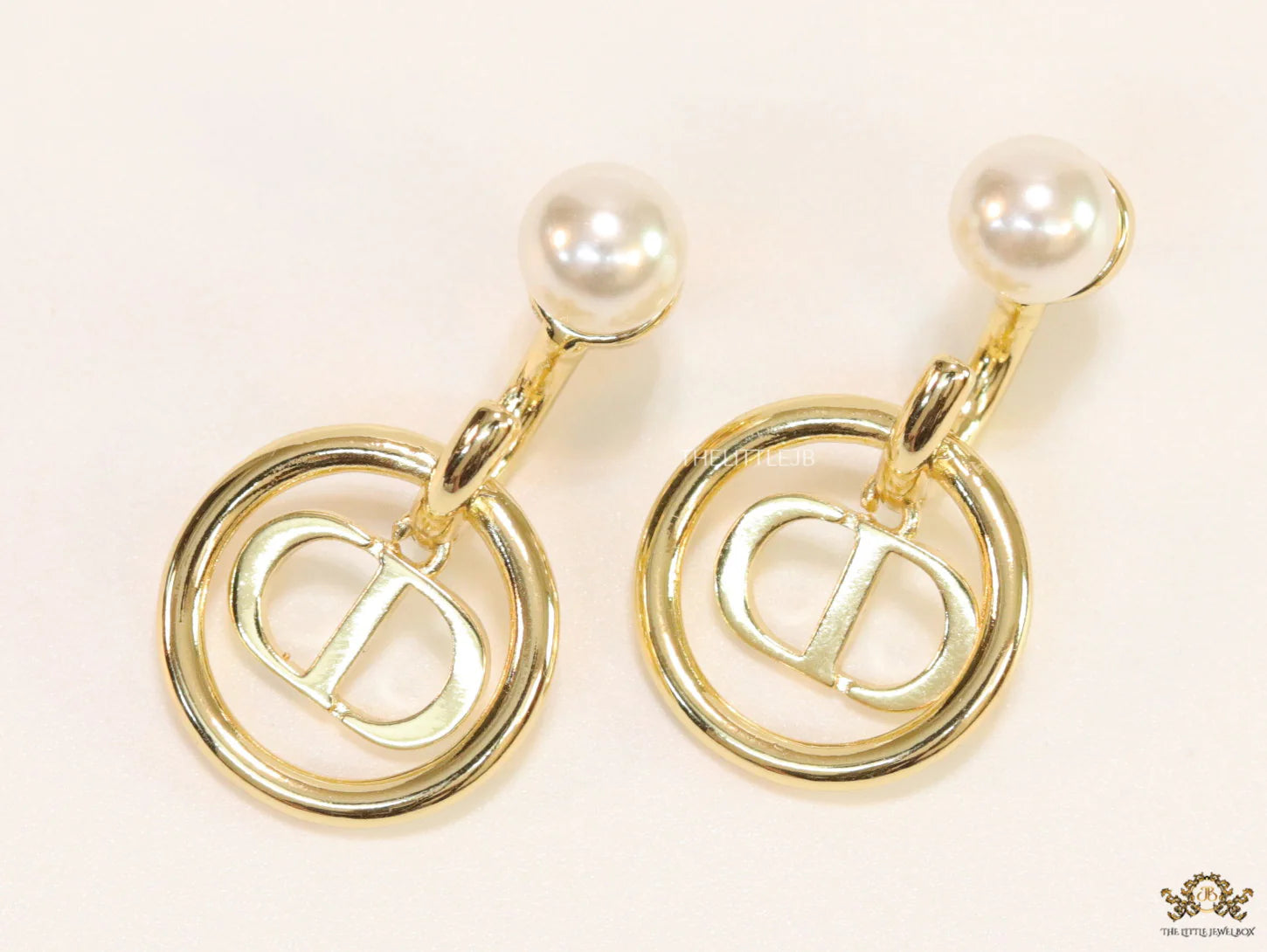 Golden alphabet earrings with pearl tops