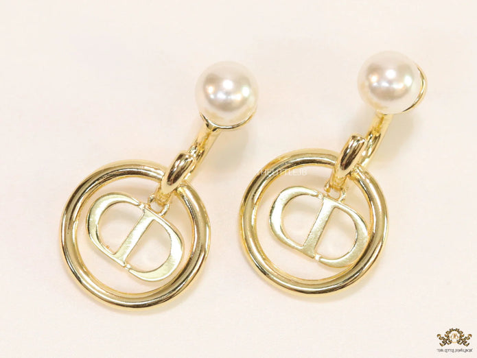 Golden alphabet earrings with pearl tops