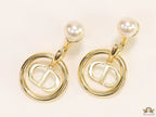 Golden alphabet earrings with pearl tops
