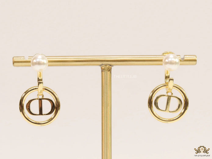 Golden alphabet earrings with pearl tops