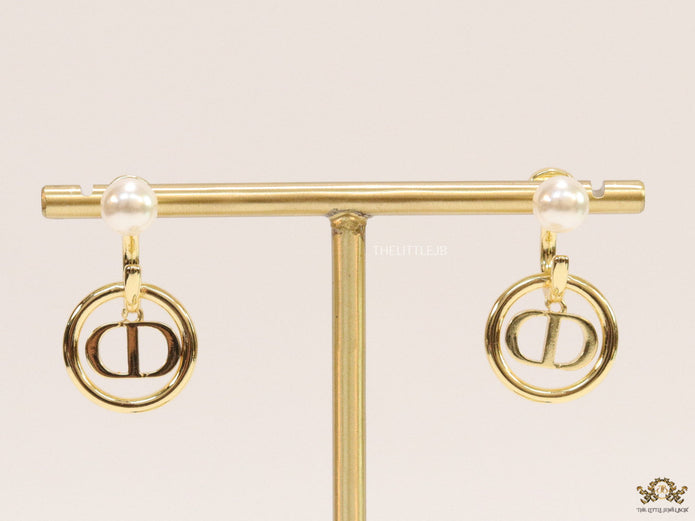Golden alphabet earrings with pearl tops