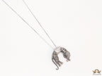 Platinum plated resting leopard pendant with cubic zirconia and Platinum chain