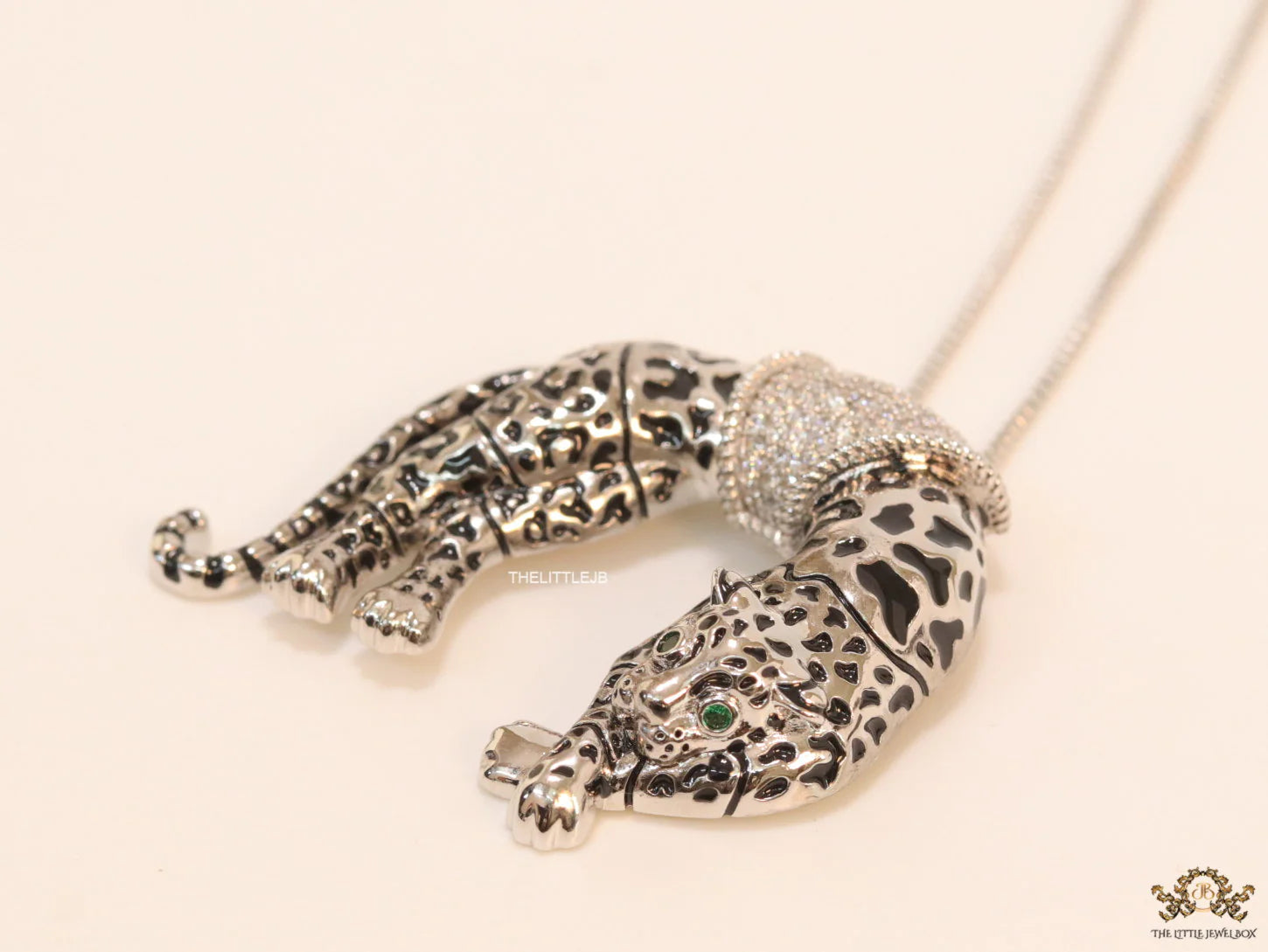 Platinum plated resting leopard pendant with cubic zirconia and Platinum chain