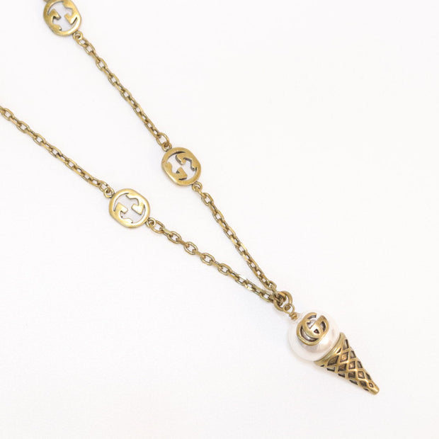Antique gold plated alphabet motif chain with golden cone pendant