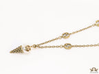 Antique gold plated alphabet motif chain with golden cone pendant