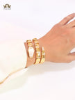 Bold gold and cz serpenti bracelet with mop head