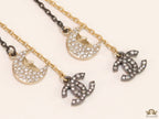 Dual chain star and moon dangles with double C motif