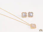 Sleek gold plated chain with cubic zirconia studded off-white clover shape pendant