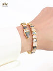 Serpenti black and gold bracelet with cz