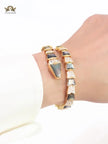 Serpenti black and gold bracelet with cz
