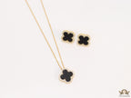 Sleek gold plated chain with cubic zirconia studded black clover shape pendant