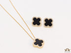 Sleek gold plated chain with cubic zirconia studded black clover shape pendant