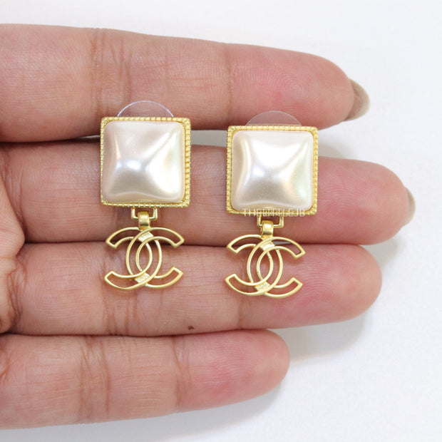 Gold plated Square MOP studs with double C motif