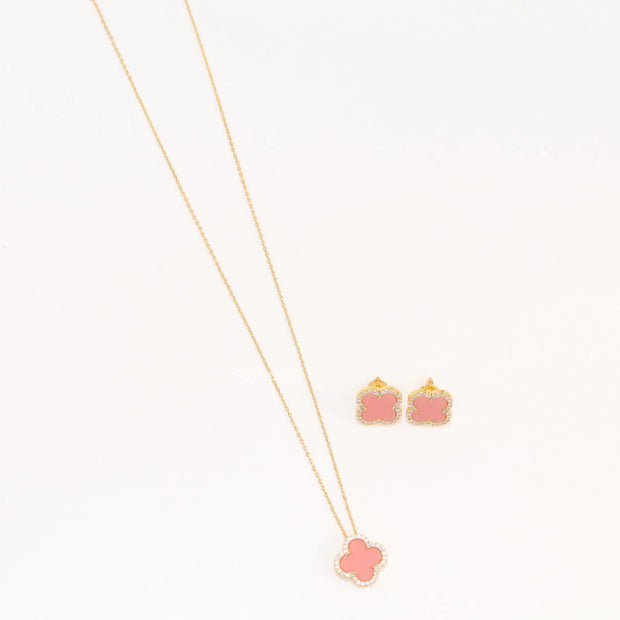 Sleek gold plated chain with cubic zirconia studded pink clover shape pendant