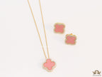 Sleek gold plated chain with cubic zirconia studded pink clover shape pendant