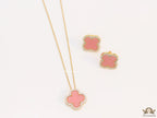 Sleek gold plated chain with cubic zirconia studded pink clover shape pendant