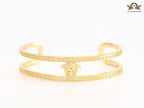 Medusa on gold bracelet