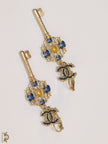 Gold plated key earrings with double C motif and clovers