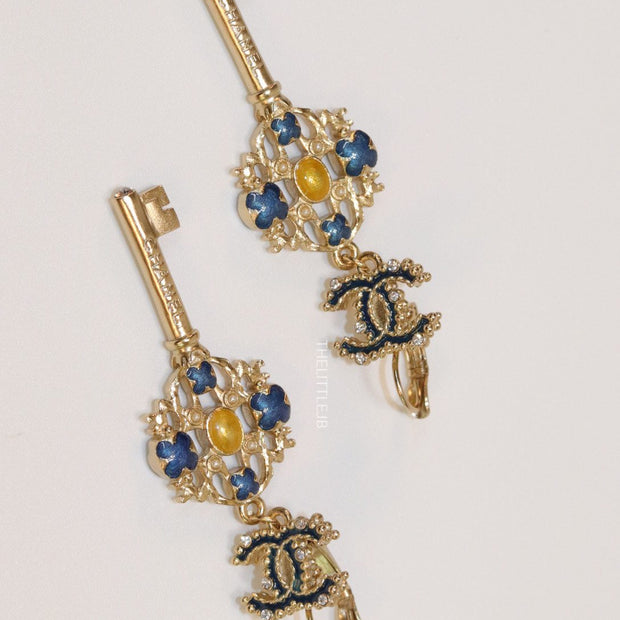 Gold plated key earrings with double C motif and clovers