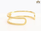 Medusa on gold bracelet