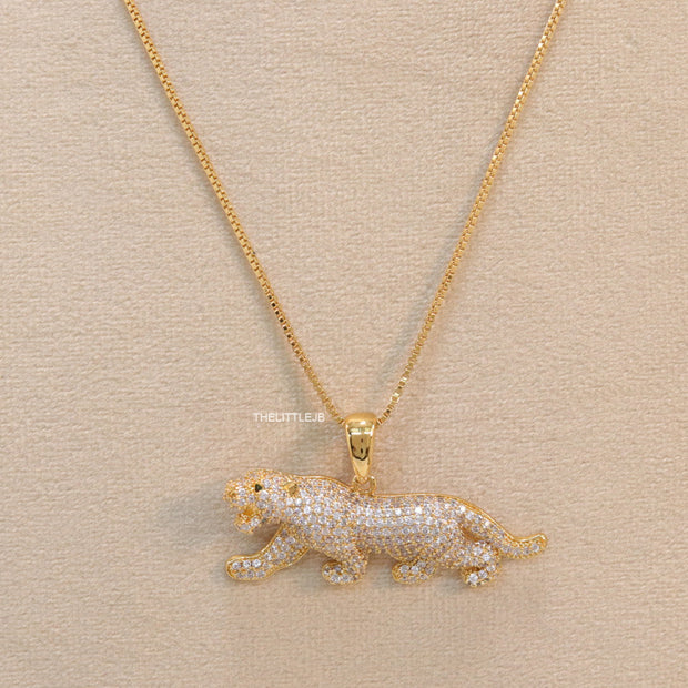 Gold plated cubic zirconia panther pendant on sleek gold plated chain