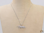 Platinum plated cubic zirconia panther pendant on sleek Platinum plated chain