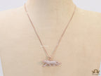 Rose Gold plated cubic zirconia panther pendant on sleek platinum plated chain
