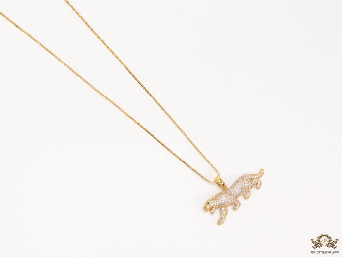 Gold plated cubic zirconia panther pendant on sleek gold plated chain
