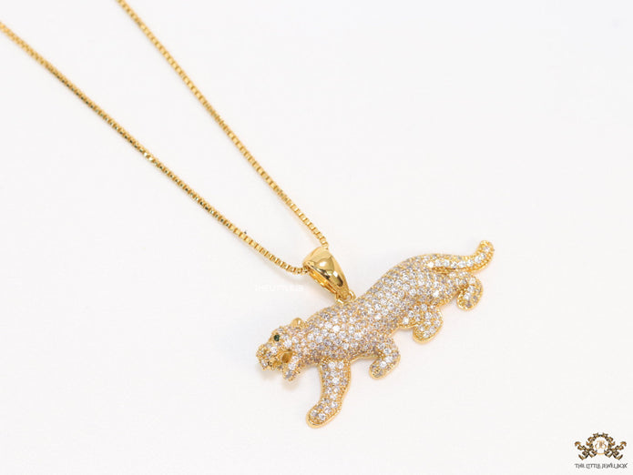 Gold plated cubic zirconia panther pendant on sleek gold plated chain