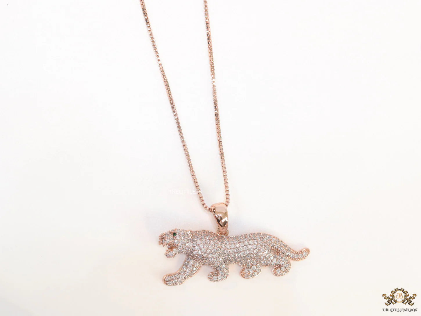 Rose Gold plated cubic zirconia panther pendant on sleek platinum plated chain