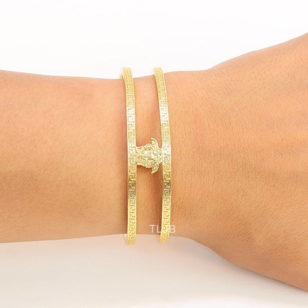 Medusa on gold bracelet